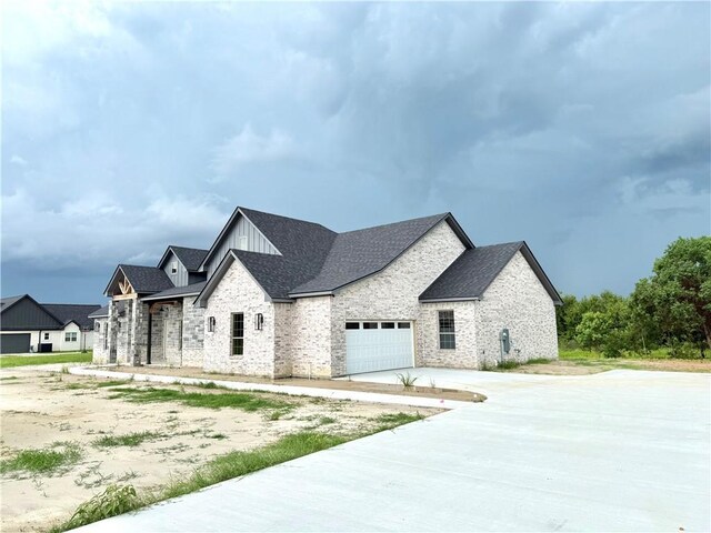 10070 Crown Pt, Iola, TX 77861 - unfurnished dining area with a raised ceiling, a chandelier, wooden ceiling, light wood finished floors, and baseboards