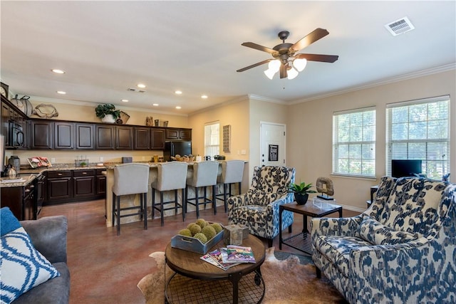 living room featuring recessed lighting, ceiling fan, and visible vents