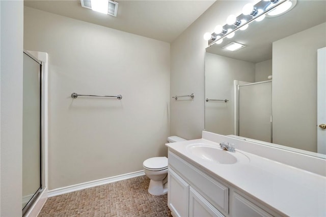 full bath with visible vents, baseboards, toilet, vanity, and a shower stall