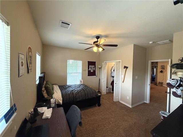 4008 Oaklawn St, Bryan, TX 77801 - carpeted bedroom with baseboards and a ceiling fan