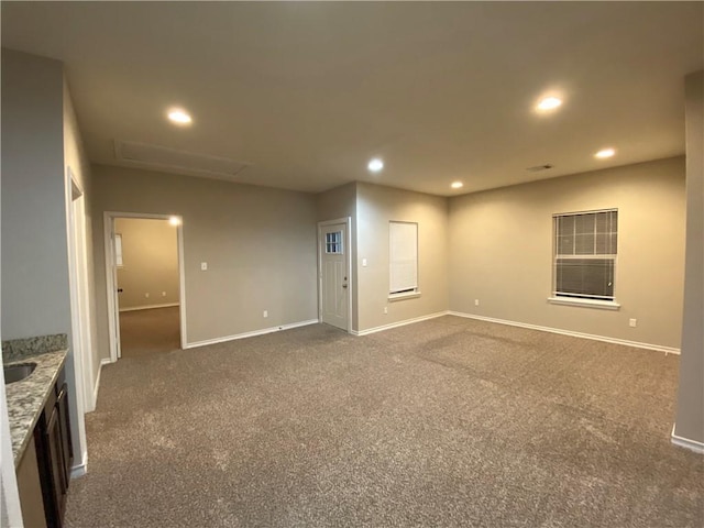 4008 Oaklawn St, Bryan, TX 77801 - unfurnished room featuring dark carpet, recessed lighting, and baseboards