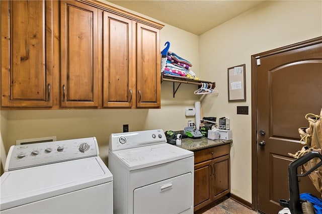 2409 Stone Castle Cir, College Station, TX 77845 - washroom featuring washing machine and clothes dryer and cabinet space