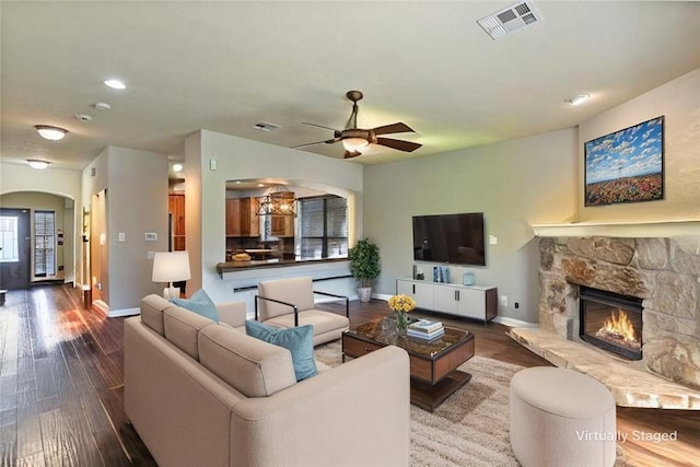 2409 Stone Castle Cir, College Station, TX 77845 - living area featuring baseboards, a ceiling fan, wood finished floors, and recessed lighting