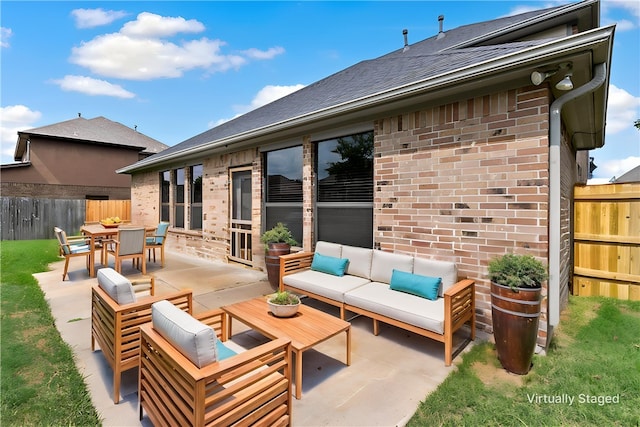 2409 Stone Castle Cir, College Station, TX 77845 - view of patio featuring an outdoor hangout area and outdoor dining area