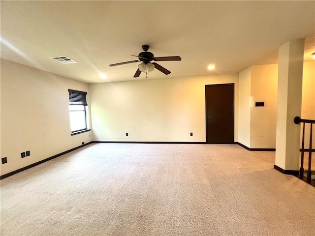 2409 Stone Castle Cir, College Station, TX 77845 - unfurnished room featuring light carpet, a ceiling fan, baseboards, and recessed lighting