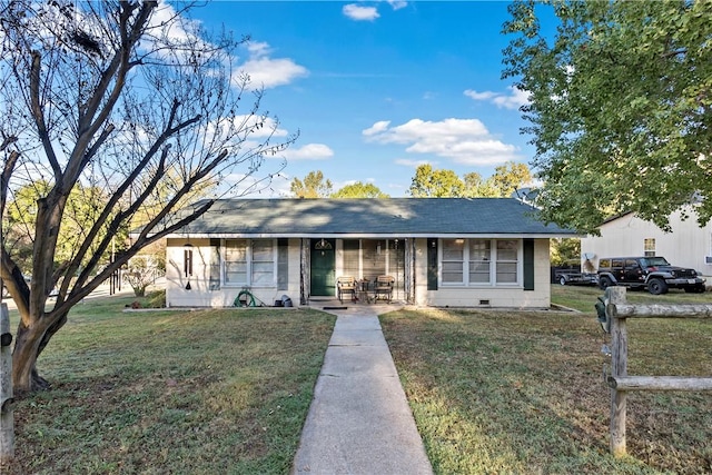 single story home featuring a front yard