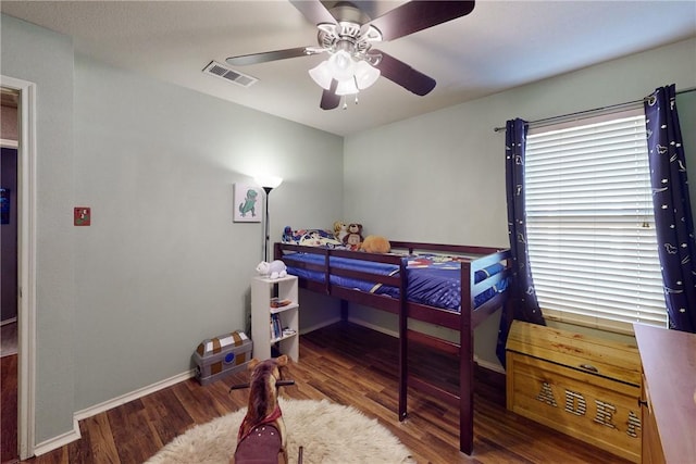 bedroom featuring ceiling fan and hardwood / wood-style floors