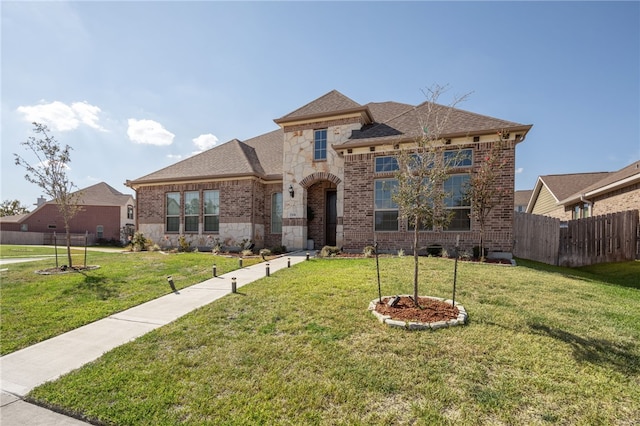 view of front of property with a front lawn