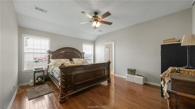 bedroom with lofted ceiling, ceiling fan, and dark hardwood / wood-style floors