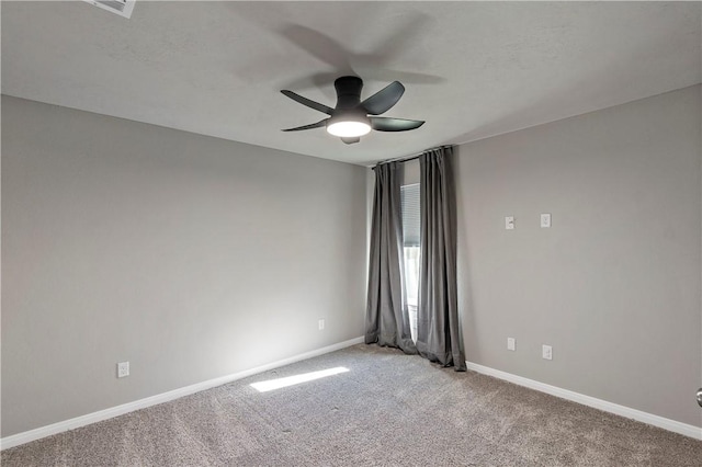 unfurnished room with light carpet and ceiling fan