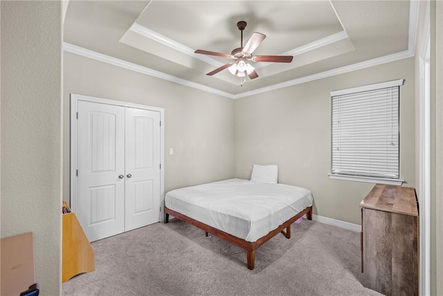 4507 Tonbridge Dr, College Station, TX 77845 - bedroom with a raised ceiling, carpet, ornamental molding, and a closet