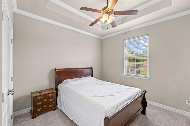 4507 Tonbridge Dr, College Station, TX 77845 - bedroom featuring a raised ceiling, light carpet, ornamental molding, baseboards, and a ceiling fan