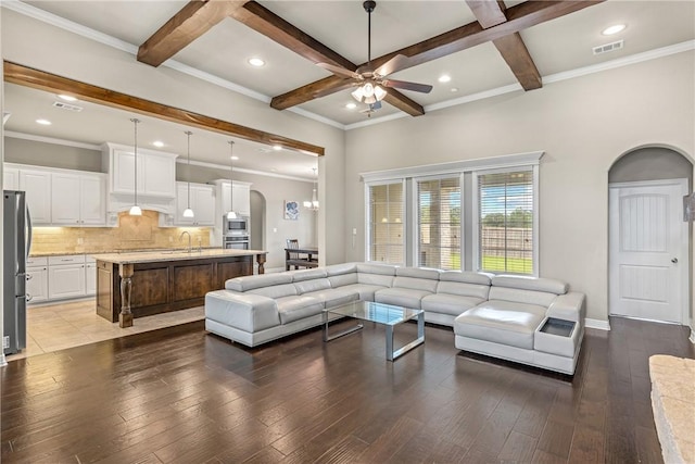 4507 Tonbridge Dr, College Station, TX 77845 - living room with a ceiling fan, coffered ceiling, arched walkways, wood-type flooring, and beam ceiling