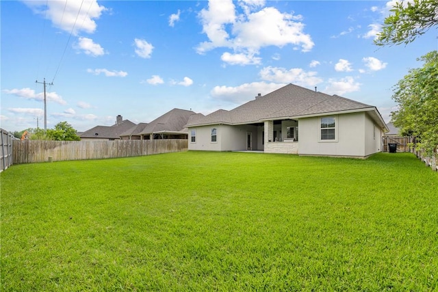 4507 Tonbridge Dr, College Station, TX 77845 - back of house featuring stucco siding and roof with shingles