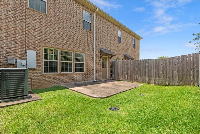 1403 Crescent Ridge Dr, College Station, TX 77845 - rear view of house with a patio area and brick siding
