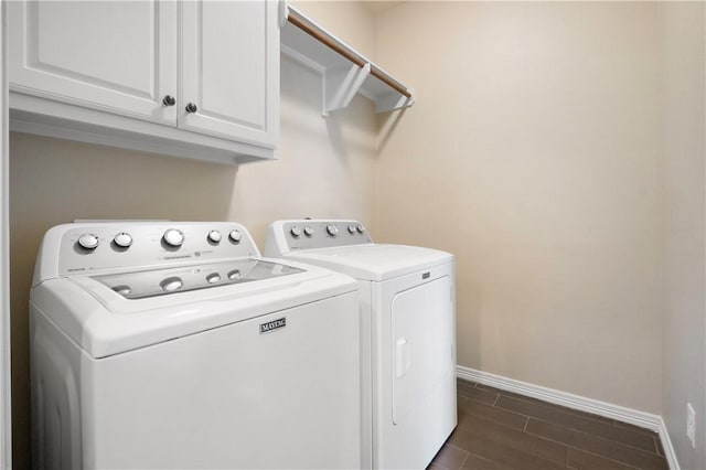 1403 Crescent Ridge Dr, College Station, TX 77845 - washroom with separate washer and dryer, cabinet space, and wood tiled floors