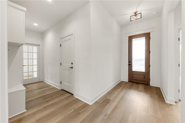 2814 Spector Dr, Bryan, TX 77808 - foyer with light wood finished floors, recessed lighting, and a chandelier
