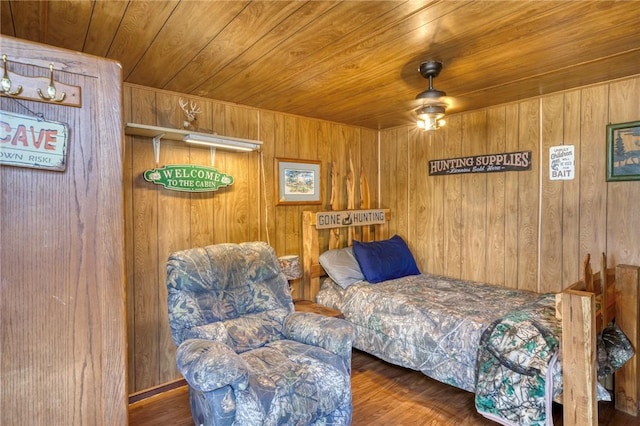 1681 Union Rd, Madisonville, TX 77864 - bedroom featuring wood walls, wooden ceiling, and wood finished floors