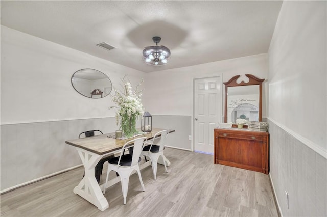 1681 Union Rd, Madisonville, TX 77864 - dining room with wood finished floors and wainscoting