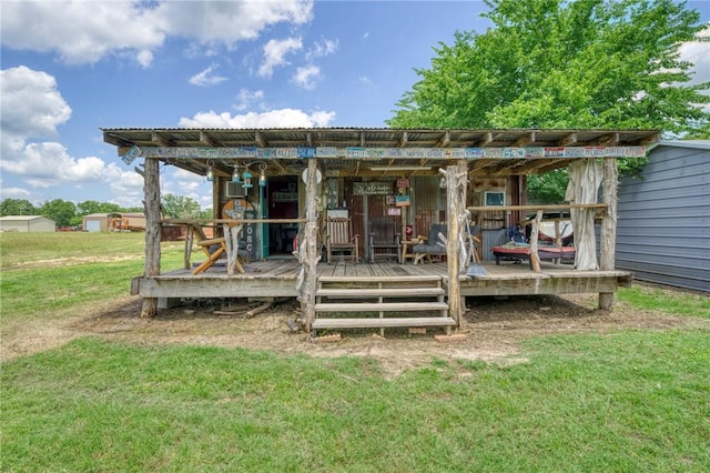1681 Union Rd, Madisonville, TX 77864 - rear view of house featuring a lawn and a wooden deck