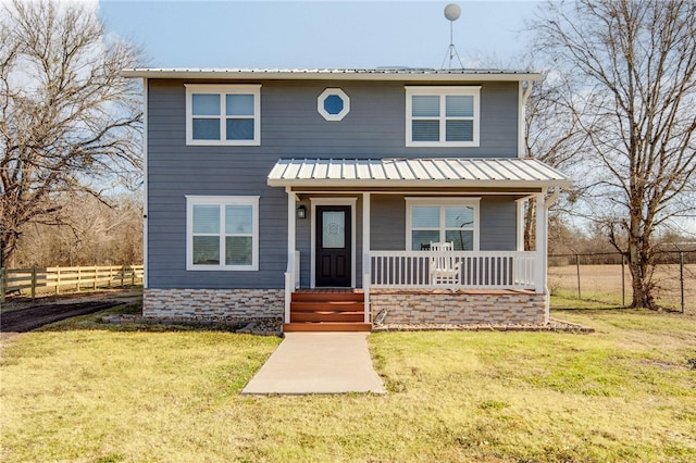 view of front of home with a porch and a front yard