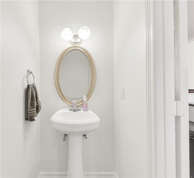 bathroom featuring baseboards
