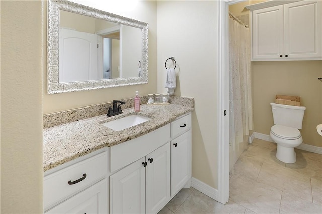 bathroom featuring baseboards, toilet, tile patterned floors, curtained shower, and vanity