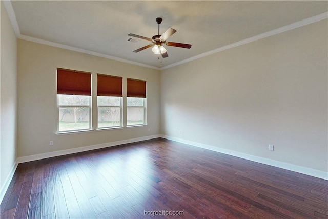 unfurnished room with baseboards, dark wood-type flooring, a ceiling fan, and ornamental molding