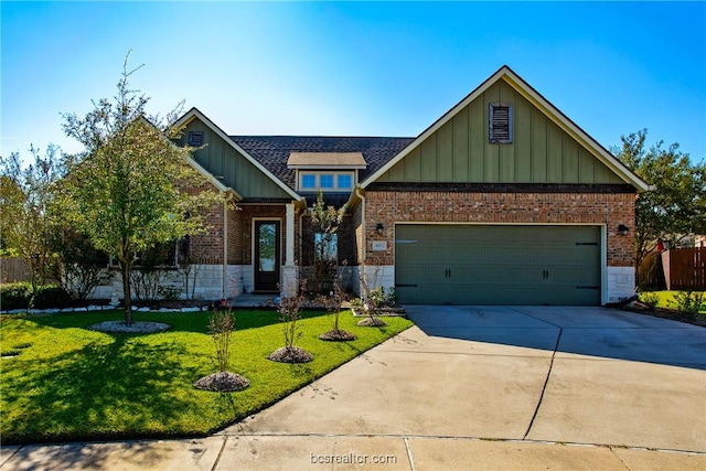 craftsman inspired home with board and batten siding, a front lawn, a garage, stone siding, and driveway