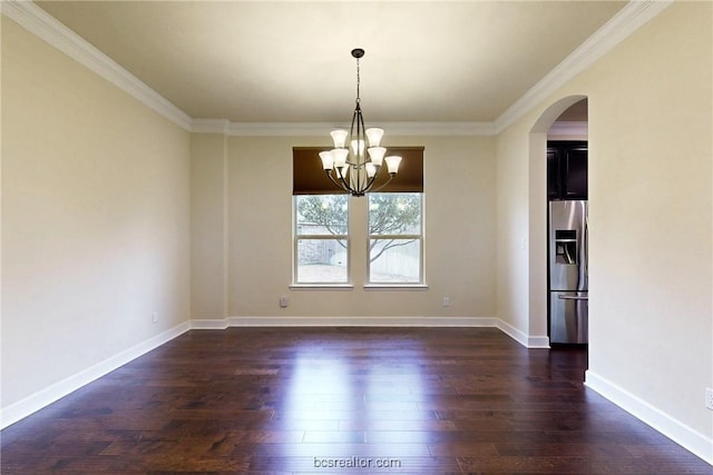 unfurnished room featuring baseboards, arched walkways, an inviting chandelier, and dark wood-style flooring