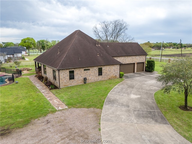 view of property exterior featuring a lawn