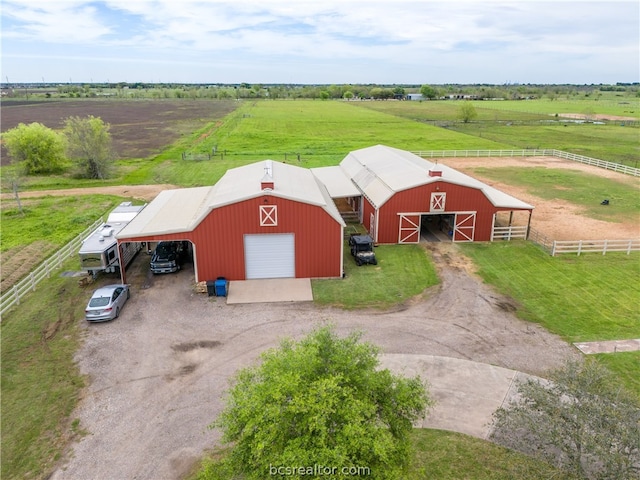 view of outbuilding with a rural view