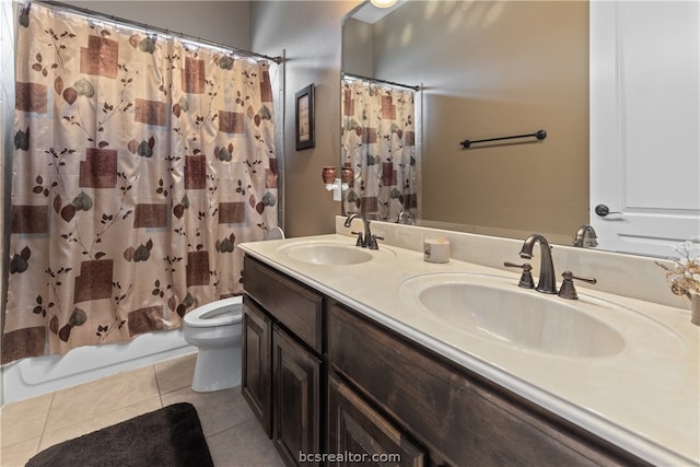 full bathroom with vanity, tile patterned flooring, shower / bathtub combination with curtain, and toilet