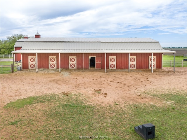 view of outdoor structure featuring a rural view