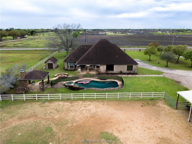 exterior space with a rural view