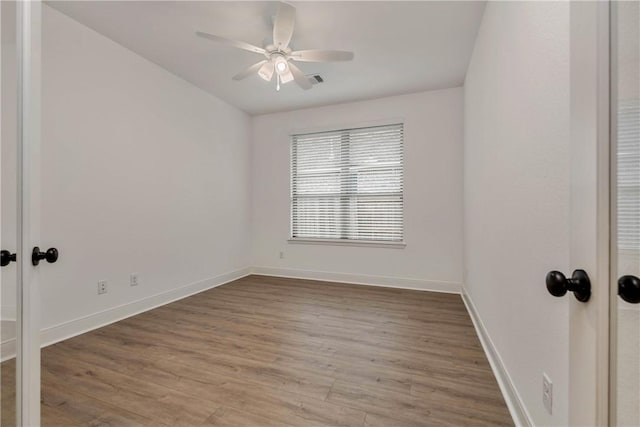 unfurnished room featuring wood-type flooring and ceiling fan