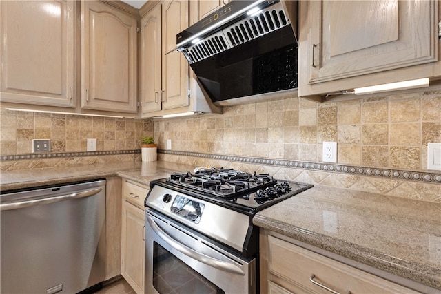 kitchen featuring decorative backsplash, appliances with stainless steel finishes, ventilation hood, light brown cabinetry, and light stone counters