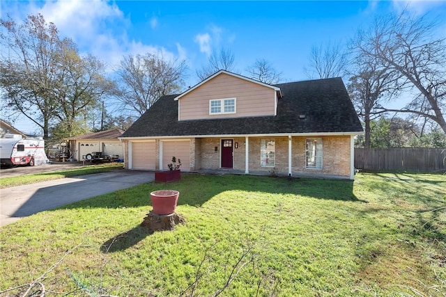 view of front facade with a garage and a front yard