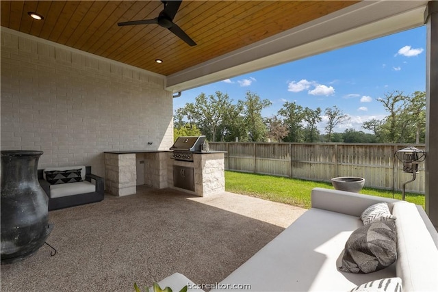 view of patio / terrace featuring area for grilling, ceiling fan, outdoor lounge area, and grilling area