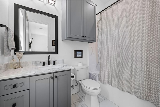 bathroom featuring toilet, vanity, and shower / bath combination with curtain