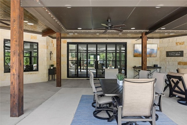 view of patio with french doors and ceiling fan