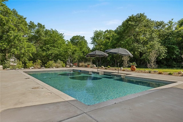 pool featuring a patio area