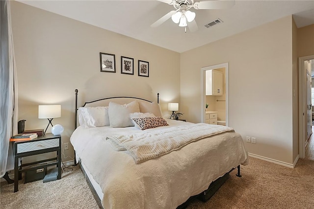 carpeted bedroom with ceiling fan and connected bathroom