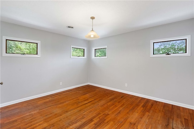 3907 Nagle St N, Bryan, TX 77801 - unfurnished room featuring baseboards and hardwood / wood-style flooring