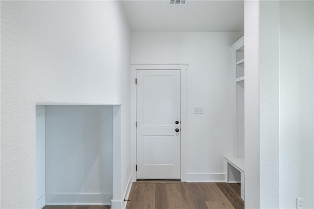 mudroom with light hardwood / wood-style floors