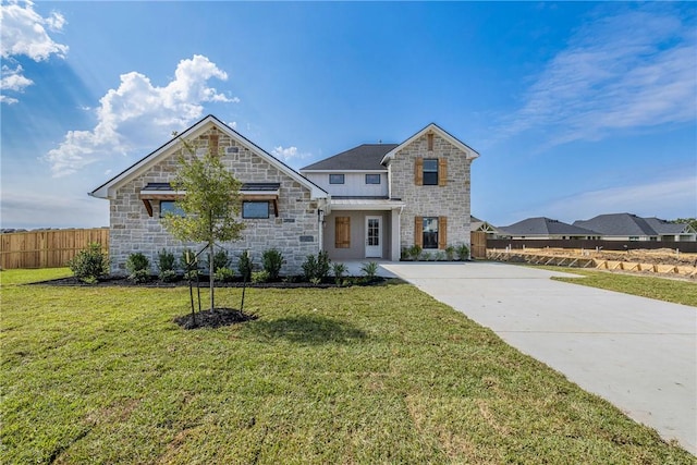 view of front of home featuring a front lawn