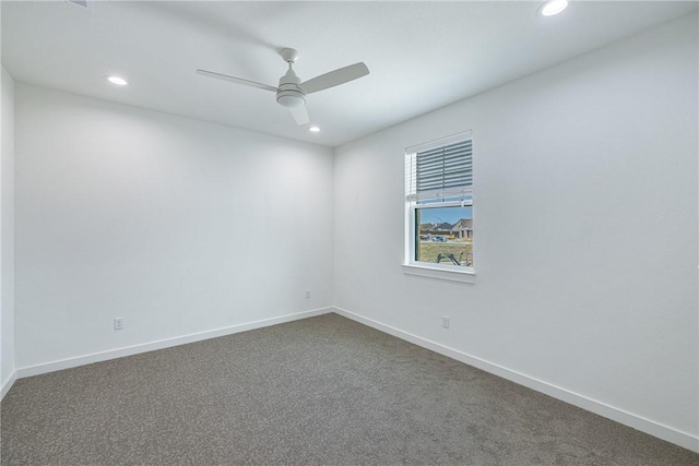 unfurnished room with ceiling fan and carpet floors