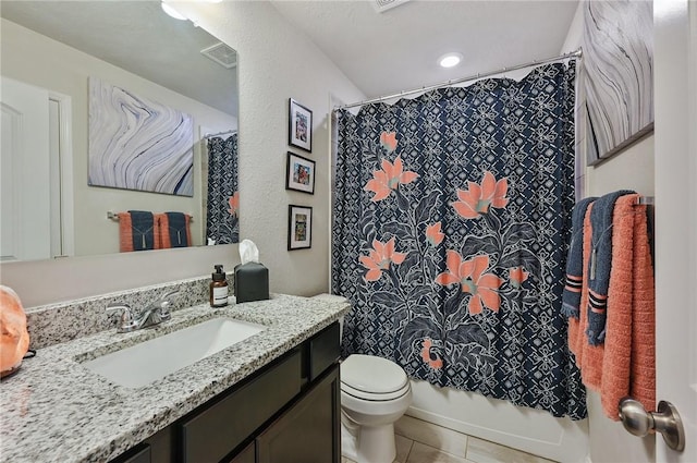 full bathroom featuring tile patterned flooring, vanity, shower / bath combination with curtain, and toilet