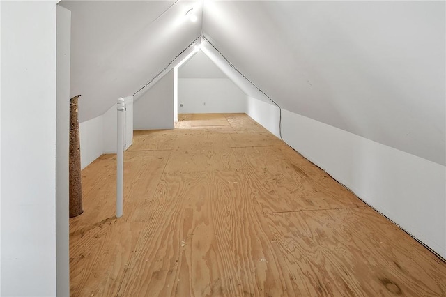 bonus room featuring lofted ceiling