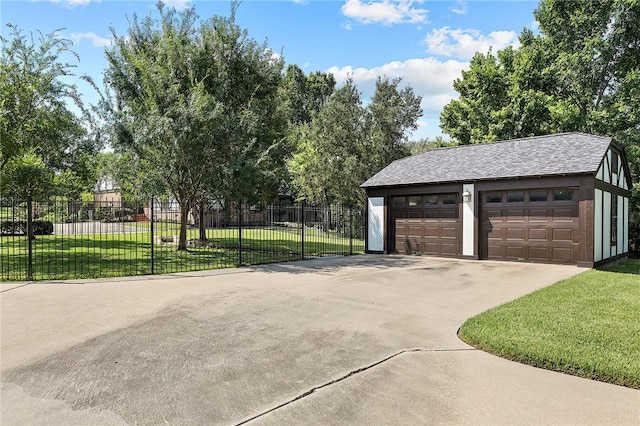 garage featuring a yard